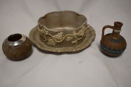 A small Doulton Silicone jug, a HM silver rim vesta striker and a Victorian marbled ceramic butter