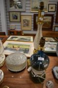 A vintage hour glass form glass lamp base with a brass and cut class lamp base and a pressed glass