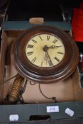 An early 20th century circular framed wall clock.