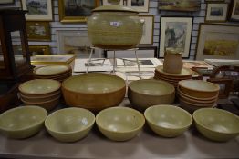 A mid century Ray Finch studio potter dinner and dessert set of bowls and plates, including a