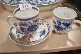 Two 18th century porcelain tea cups having an I mari pattern with a similar saucer AF.