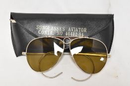 A vintage pair of Kuang Huei Aviator Sunglasses Contr. No 40482-84, with original case.