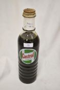 A genuine new old stock bottle of Castrol motor oil.