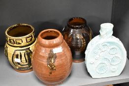 Four studio pottery vases including two mid century terracotta ground with abstract decoration.