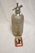 An early 20th century Art Deco Sparklets soda siphon bottle.