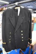 An early 20th century Naval officers military dress suit