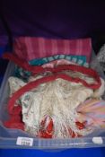 A mixed box of textiles, including knit wear and scarves etc.