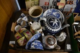 A Jasper ware style blue embossed tea pot, an Oriental style tea pot and jug and a Wedgwood embossed
