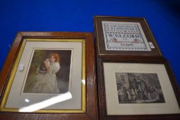 Two pictures in wooden frames, one featuring a girl with a cat and the other an etching and a framed