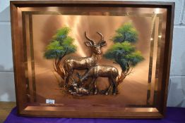 A mid century copper relief plaque of a family of African Gazelle. 60cm x 45cm