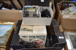 A Sawyer's View-Master Mod.De Luxe slide viewer projector, two View Masters with circular slides and