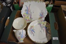 A Foley China part tea service (9 pieces approx) in a pretty cottage garden design.