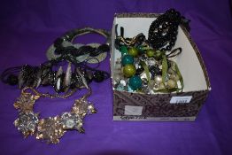 Costume jewellery including various large necklaces including turquoise stone.
