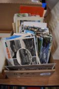 A selection of vintage postcards including black and with photographic.