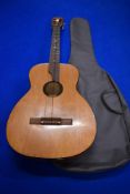An unbranded classical parlour guitar