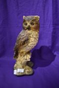 A mid century chalk ware study of an owl 31cm tall.