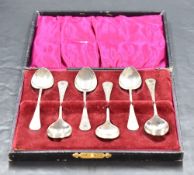 A cased set of George V silver coffee spoons, with foliate engraved handles, marks for Birmingham