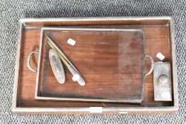 A Japanese Meiji period white metal mounted hardwood tray, of plain rectangular form with short
