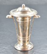 A George VI silver golfing trophy, the domed finial topped lift-off cover over the flared
