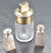 An unusual Victorian silver mounted glass bottle, of cylindrical form, the twist-off cover with