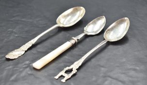 An Edwardian silver spoon, with foliate and scroll decorated capital engraved 'Elma' marks for
