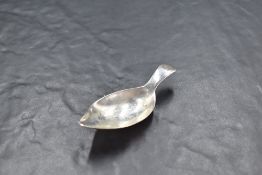 A George III silver caddy spoon, nicely shaped oval bowl and short Old English handle with