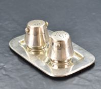 A 925 grade white metal condiment set, comprising a salt and pepperette, each of spreading