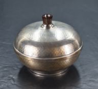 A George V silver mounted bakelite dressing table powder box, of compressed spherical form with