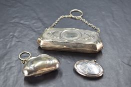 A small George V silver powder box, of oval form, the hinged cover engraved with ribbon, foliate