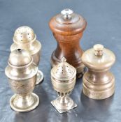 A Queen Elizabeth II silver mounted pepper mill, of traditional form, marks for London 1984, maker M