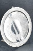 A Victorian silver salver, of shallow dished circular form with bands of repeating engraved