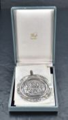 A rare early 19th century Austro-Hungarian white metal baptismal medal, Vienna, of circular form