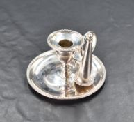A 19th century 'go to bed' chamber stick of traditional form with beaded rim decoration, removable