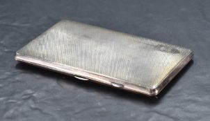 A George VI silver cigarette case, of hinged rectangular form, engine turned throughout, with