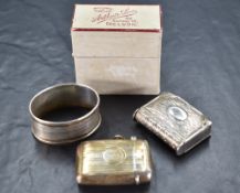 A George V silver vesta case, hinged rectangular form with engine turned decoration, marks for