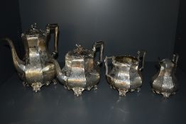 A Victorian silver four-piece teaset, comprising teapot, hotwater pot (both with ivory insulators to