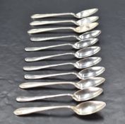 A set of six George V silver ribbon and thread pattern teaspoon, marks for Sheffield 1928, maker