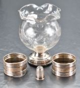 A pair of George V silver napkin rings, marks for Birmingham 1920, maker A & J Zimmerman Ltd,