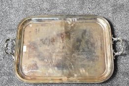 A large A1 electro-plated two-handled tray, of rounded rectangular form with scroll and shell form