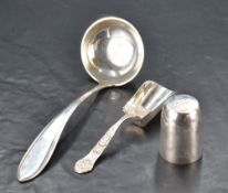 A 20th century Dutch white metal sauce ladle, of moulded and tapering form, marks for 2nd standard
