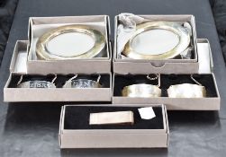 A group of five boxed and branded silver Concorde gift items, comprising two circular photograph
