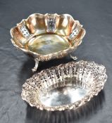 A George VI silver dish, of shaped circular form with pierced decoration and raised on out-swept