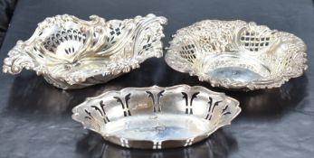 An Edwardian silver dish, of embossed and pierced oval form decorated with scrolls and foliate