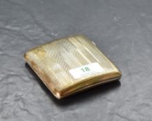 A George V silver cigarette case, of hinged rectangular form, curved for the gentleman's pocket