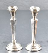 A pair of Queen Elizabeth II silver candlesticks, of traditional form with marks for Birmingham