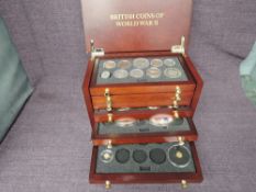 A collection of GB Coins & Medallions including Silver Coins and two small Gold Coins, two large