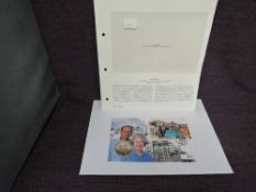 A Queen Elizabeth II Isle of Man 1997 Gold 1oz 5 Pound Coin on large Queen's Golden Wedding
