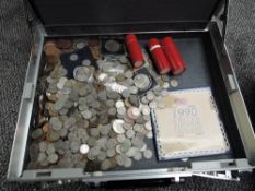 A collection of GB & World Coins in a briefcase including uncirculated Pennies & Half Pennies,