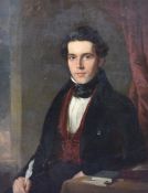 An 18th century oil on canvas, portrait of a handsome young gentleman, unsigned, within a broad