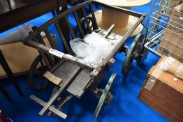 A vintage dog cart or similar